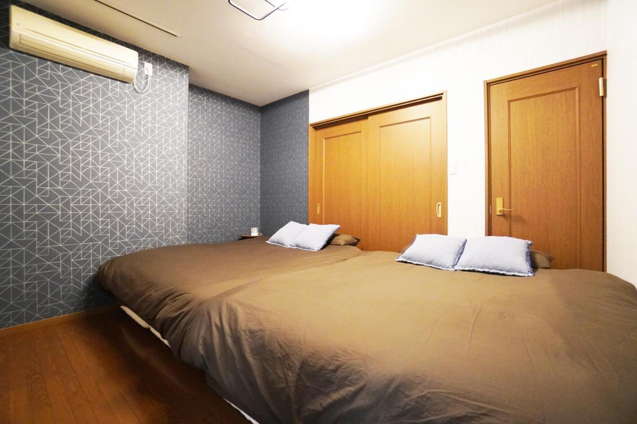 Tsurigane Building H-4 Appartement Osaka Buitenkant foto