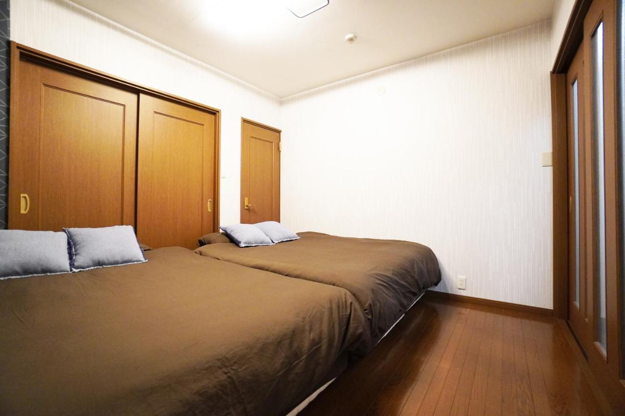 Tsurigane Building H-4 Appartement Osaka Buitenkant foto